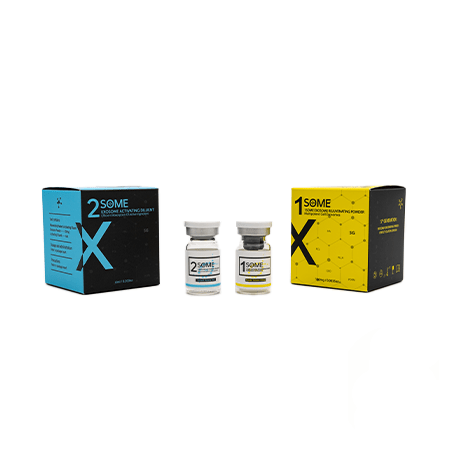Two boxes, one blue and one yellow, with two small vials in between.