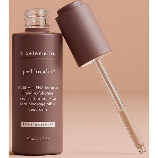 A brown bottle of Bioelements Peel Breaker with a dropper showing the liquid.
