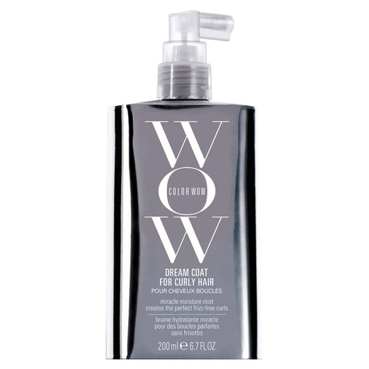 Color WOW Dream Coat for Curly Hair in a gray bottle with a clear pump.