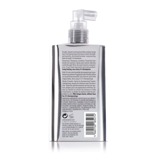 A silver spray bottle with a white pump and cap, featuring product details on the back.