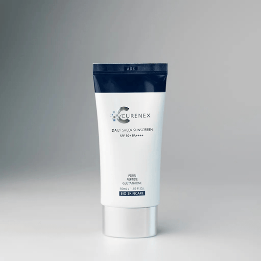 Curenex Daily Sheer Sunscreen SPF 50+ PA++++ in a white and navy tube.