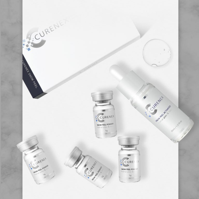 Curenex Snow Peel kit with activator bottle, four powder vials, and a drop of liquid.