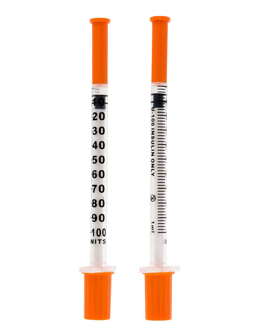 Two orange-capped insulin syringes with clear barrels and black markings.