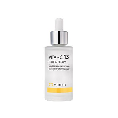 MERIKIT Vita-C 13 Return Serum in a frosted glass bottle with a dropper.