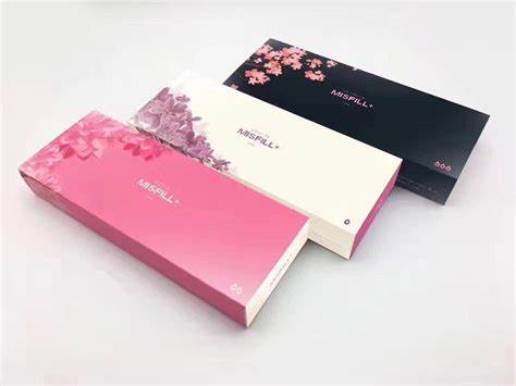 Three rectangular boxes of Misfill+ dermal filler are arranged diagonally on a white surface.