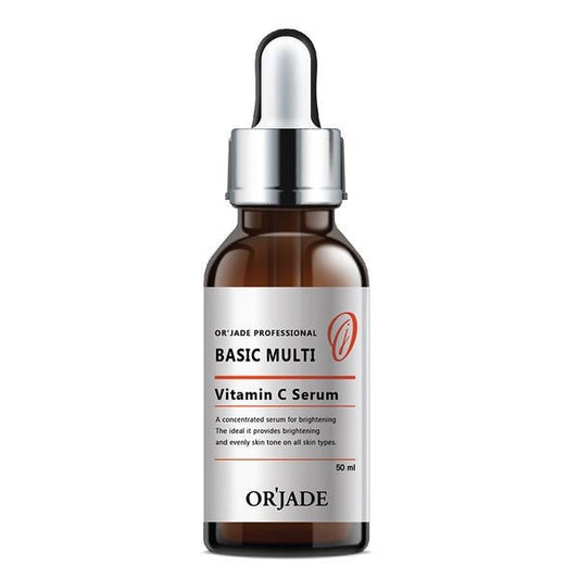 A brown glass dropper bottle of OR'JADE Vitamin C Serum with a white and orange label.