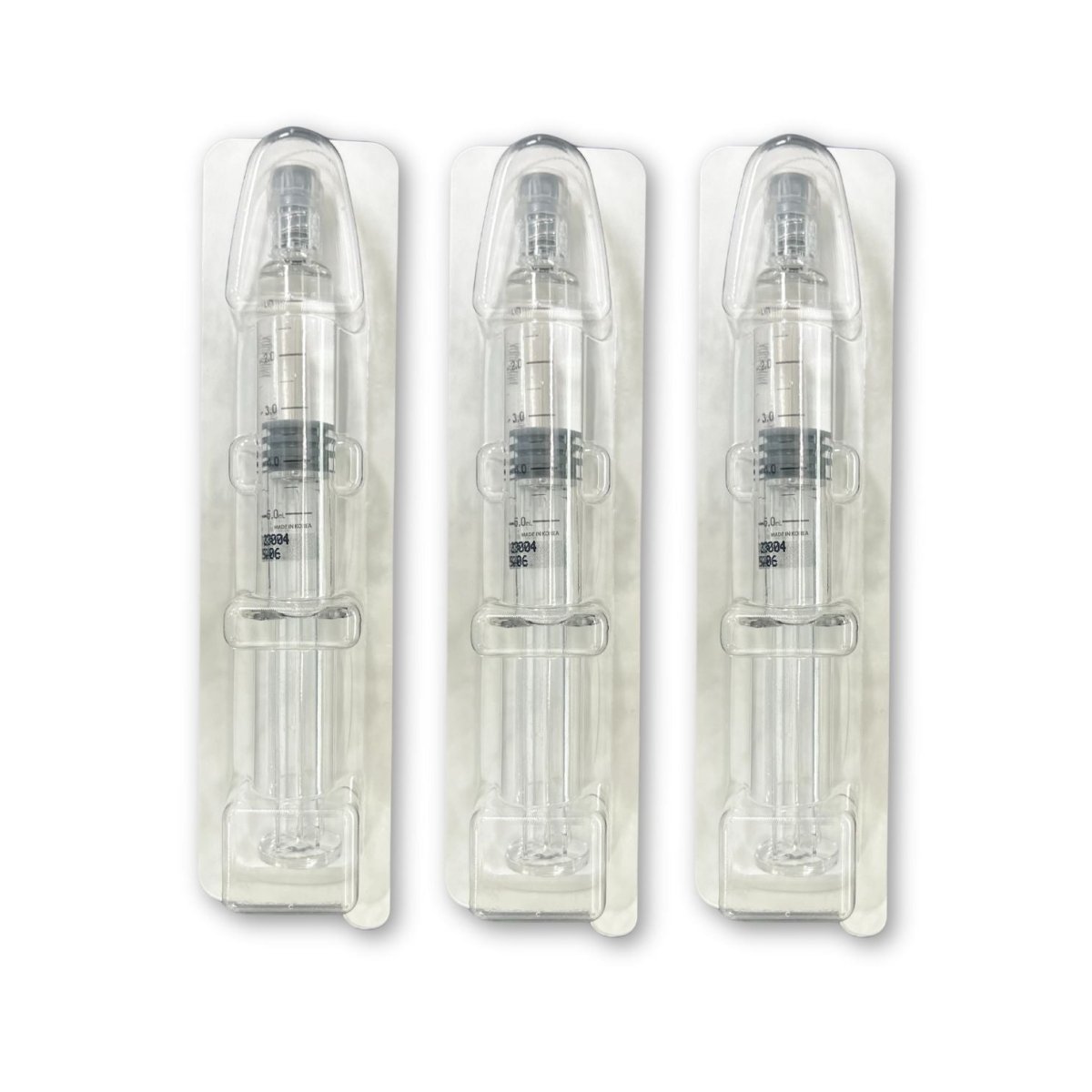 Three clear syringes with black markings are packaged in individual plastic blisters.